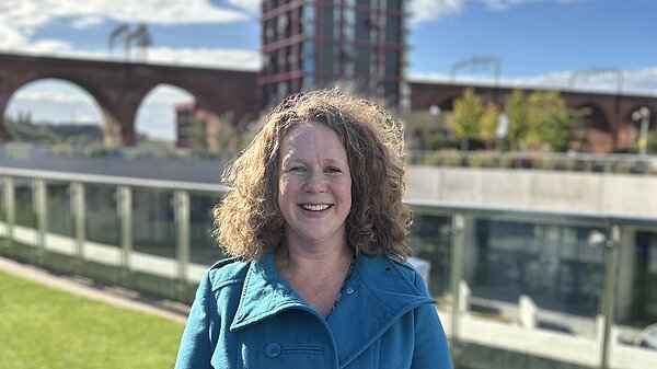 Alice Delemare in front of Stockport Viaduct